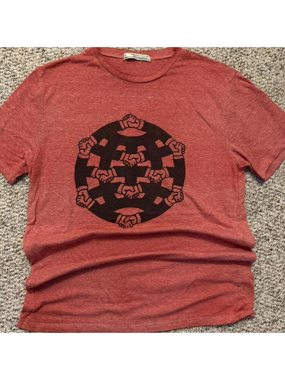 Threads 4 Thought Red/black hands graphic tee